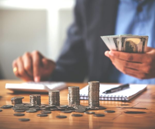 money saving business On a table with sunlight. Money Saving Ideas for Financial Accounting